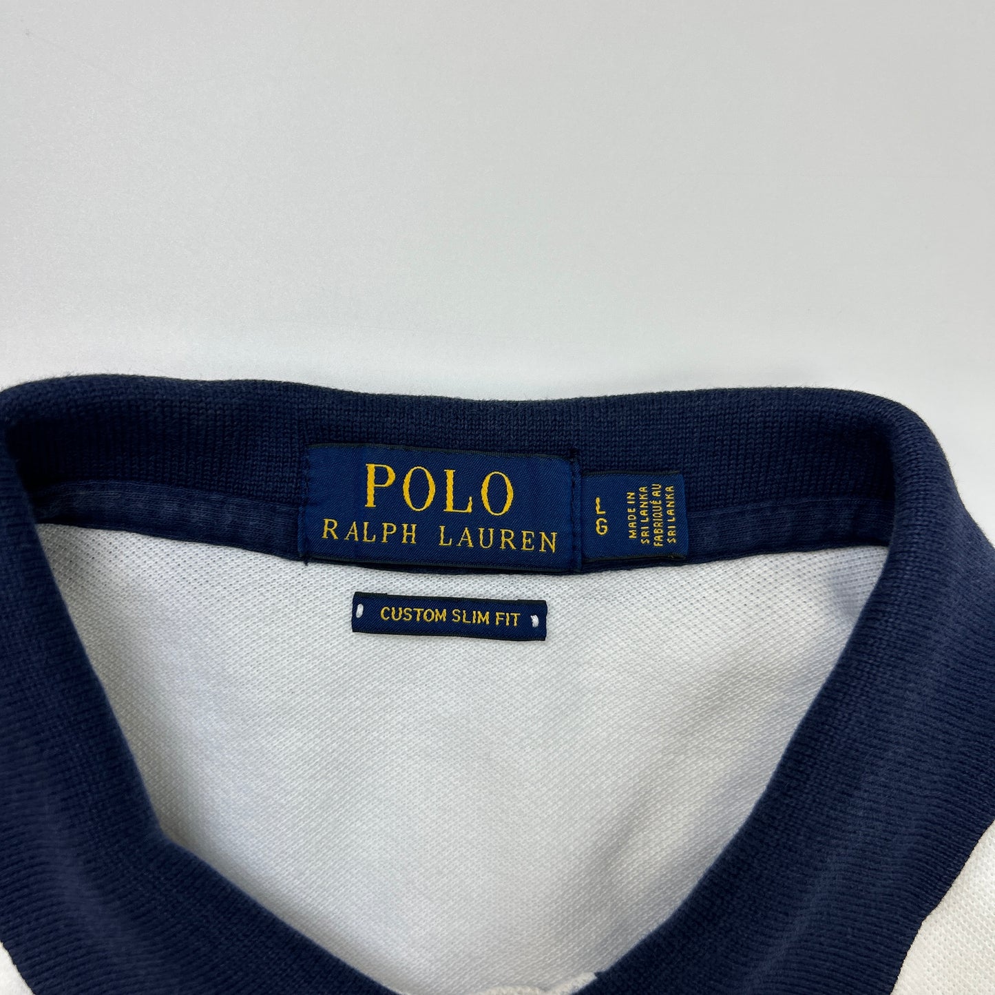 Ralph Lauren Polo (L)