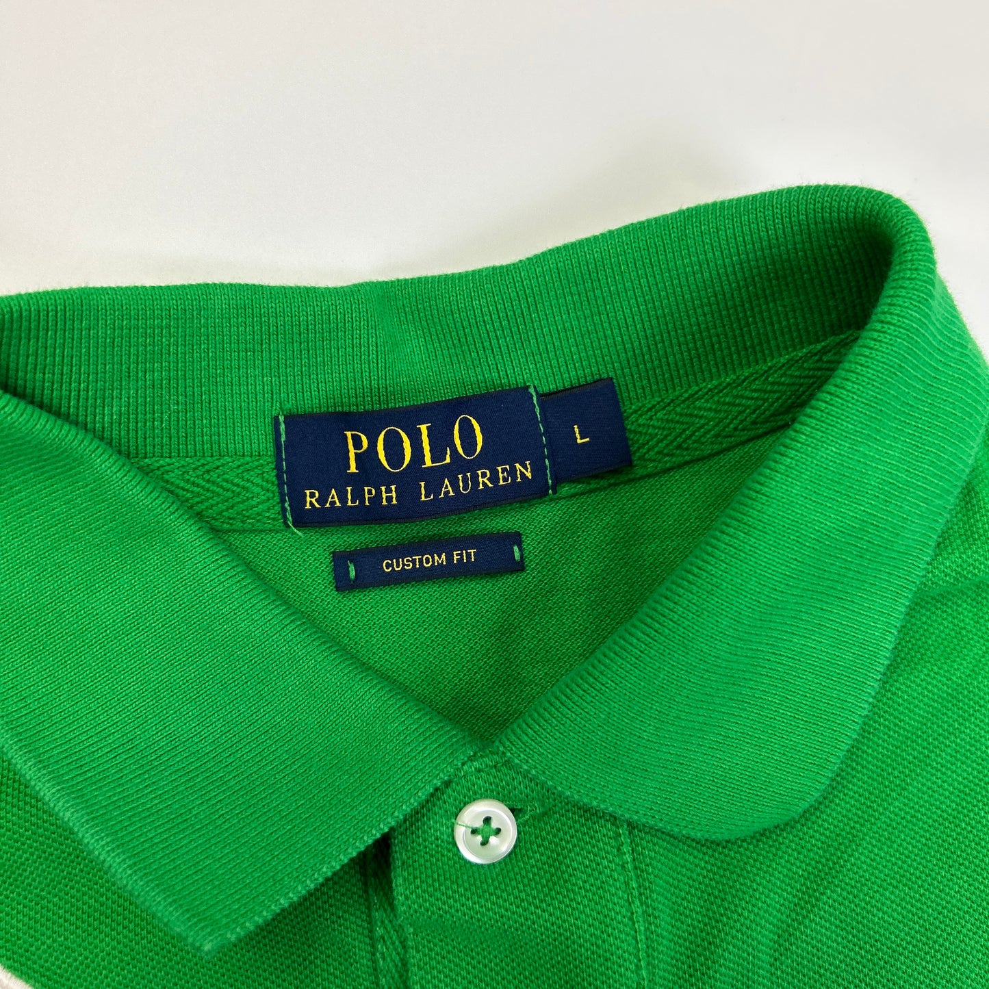 Ralph Lauren Polo (L)