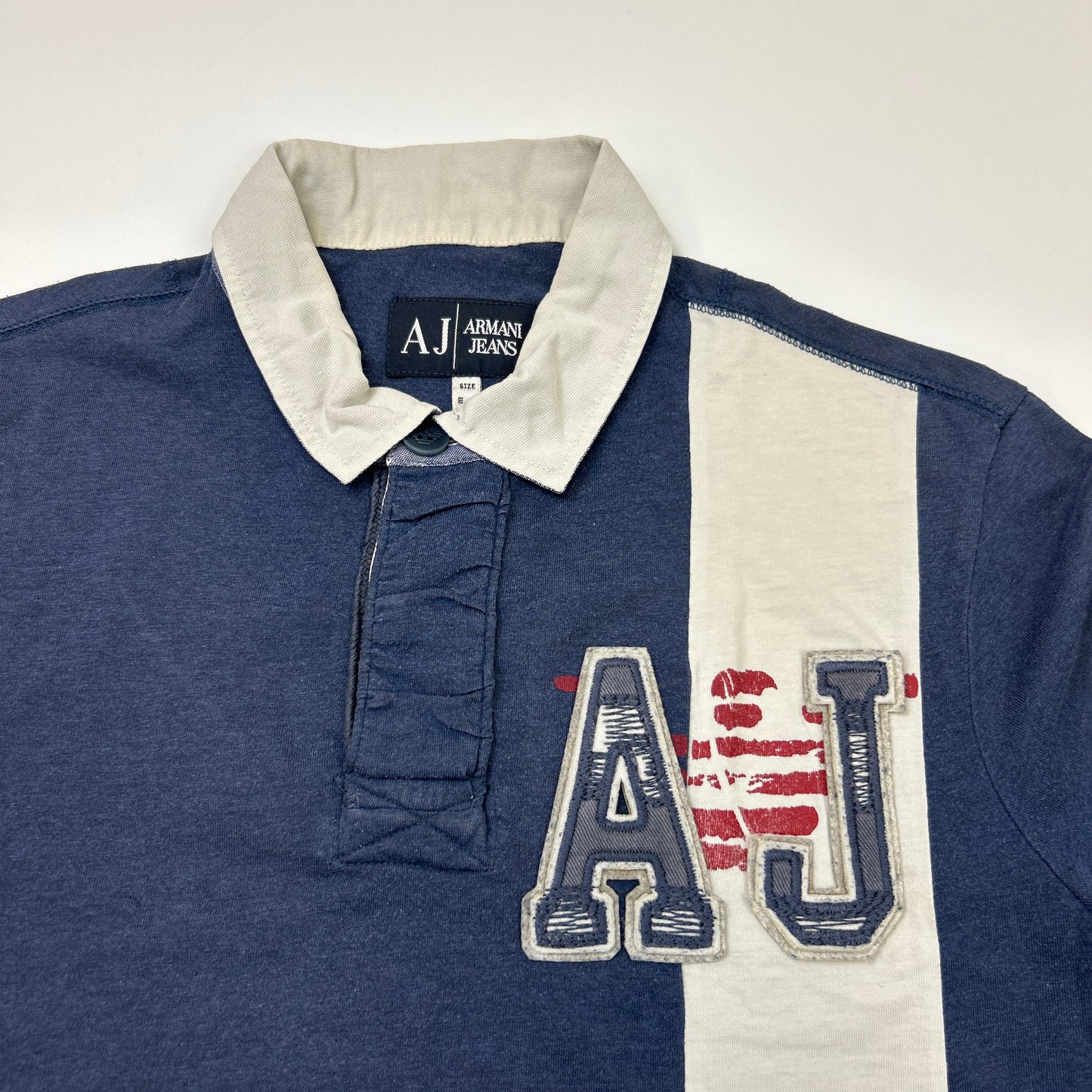 Armani Polo (L)