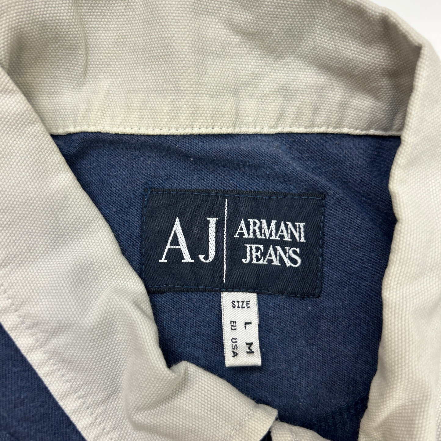Armani Polo (L)