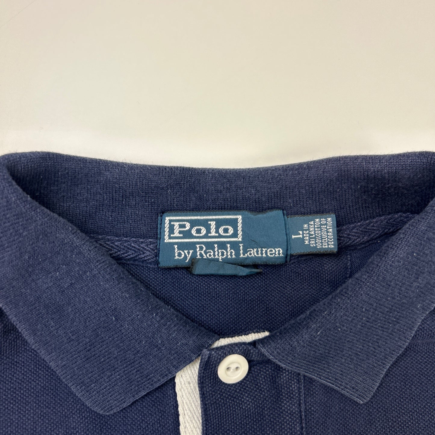 Ralph Lauren Polo (L)