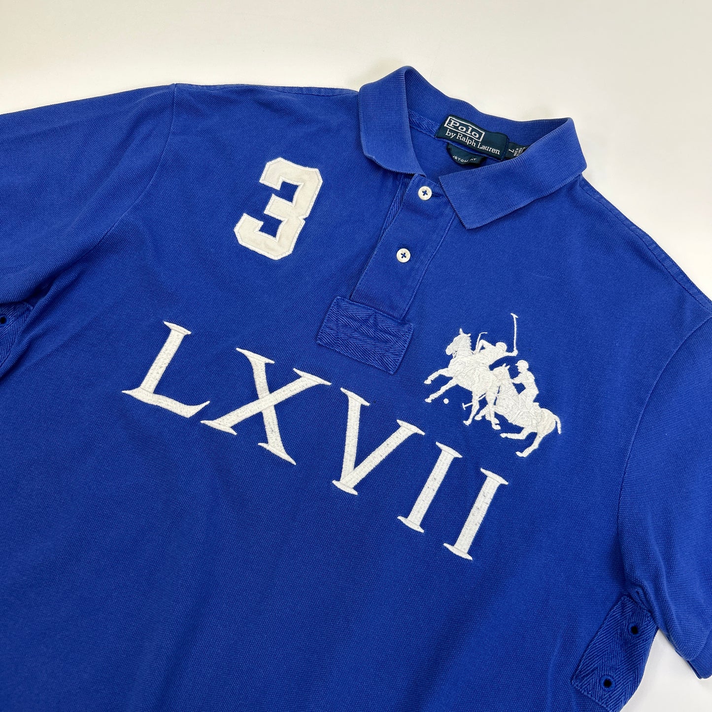 Ralph Lauren Polo (L)