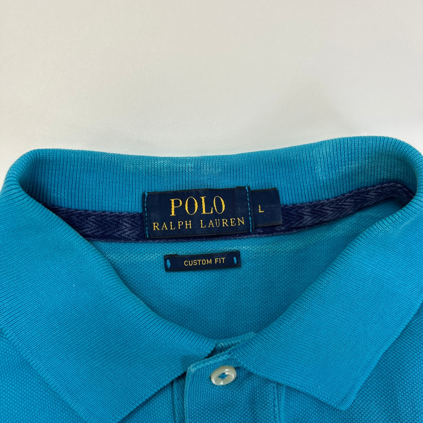 Ralph Lauren Polo (L)