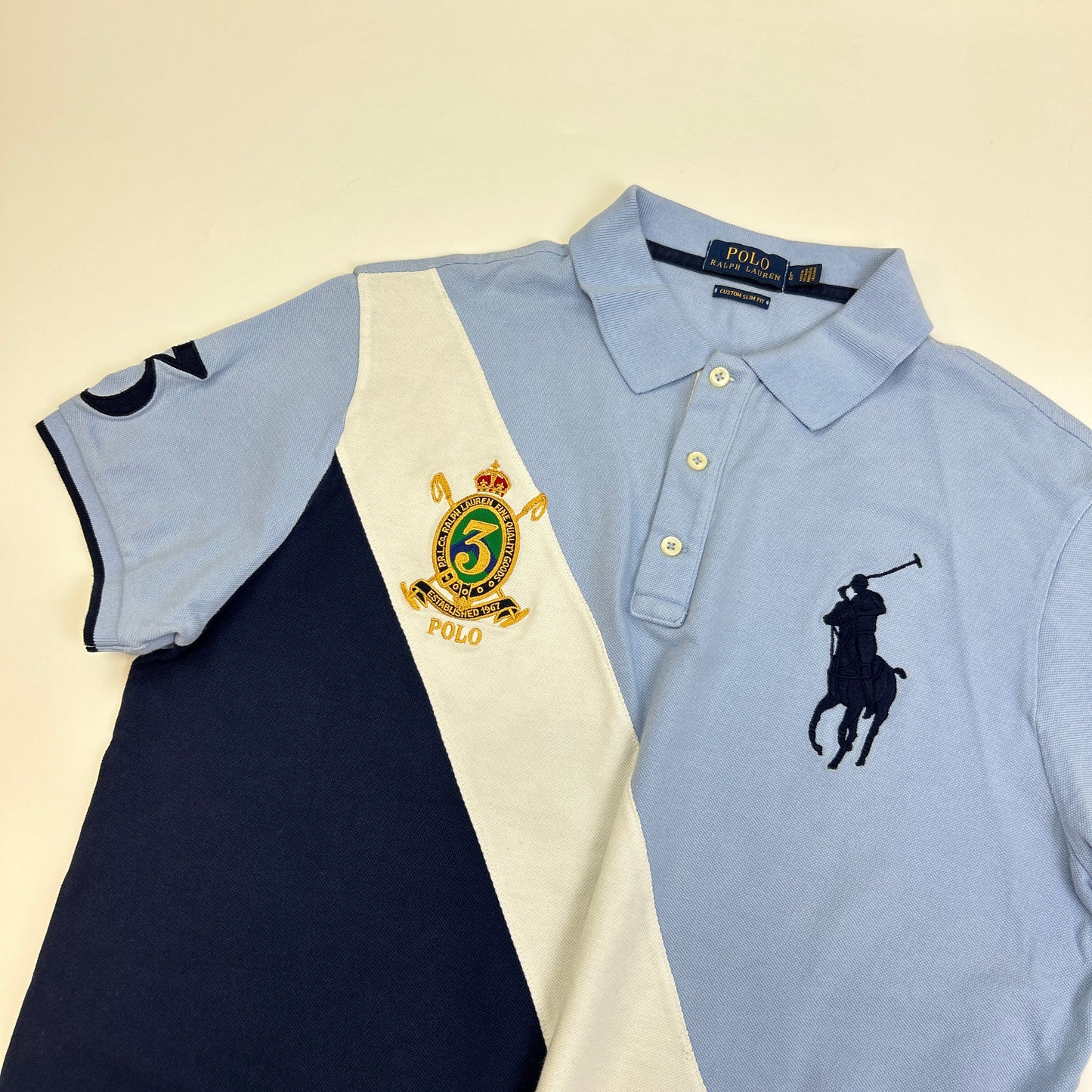 Ralph Lauren Polo (L)