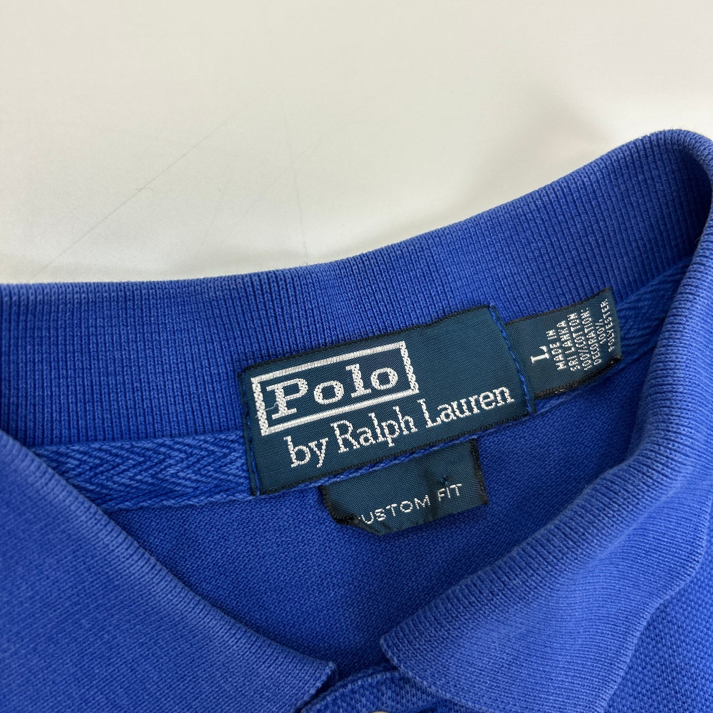 Ralph Lauren Polo (L)