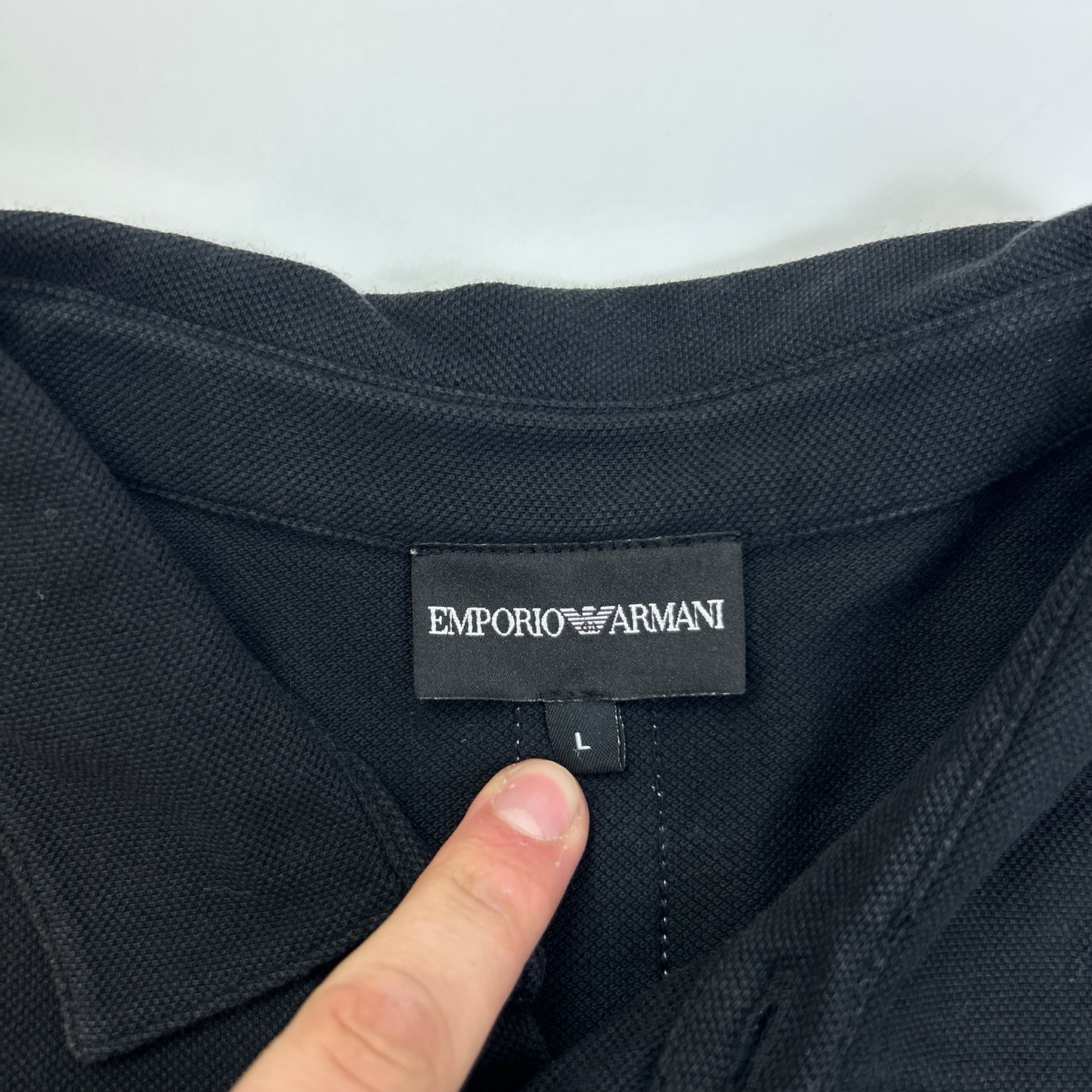 Armani Polo (L)