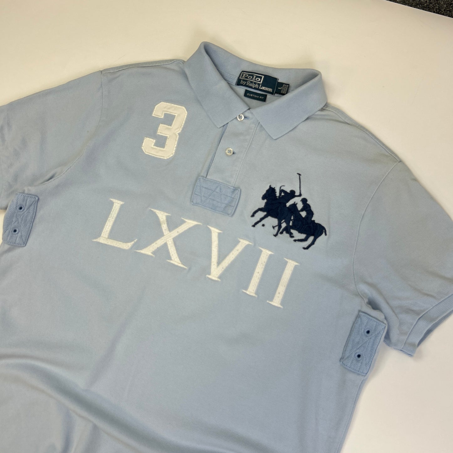 Ralph Lauren Polo (L)