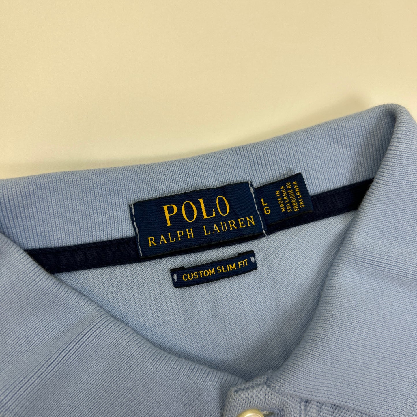 Ralph Lauren Polo (L)