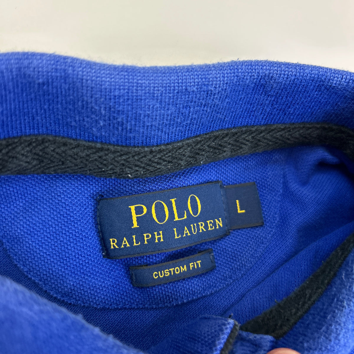 Ralph Lauren Polo (L)