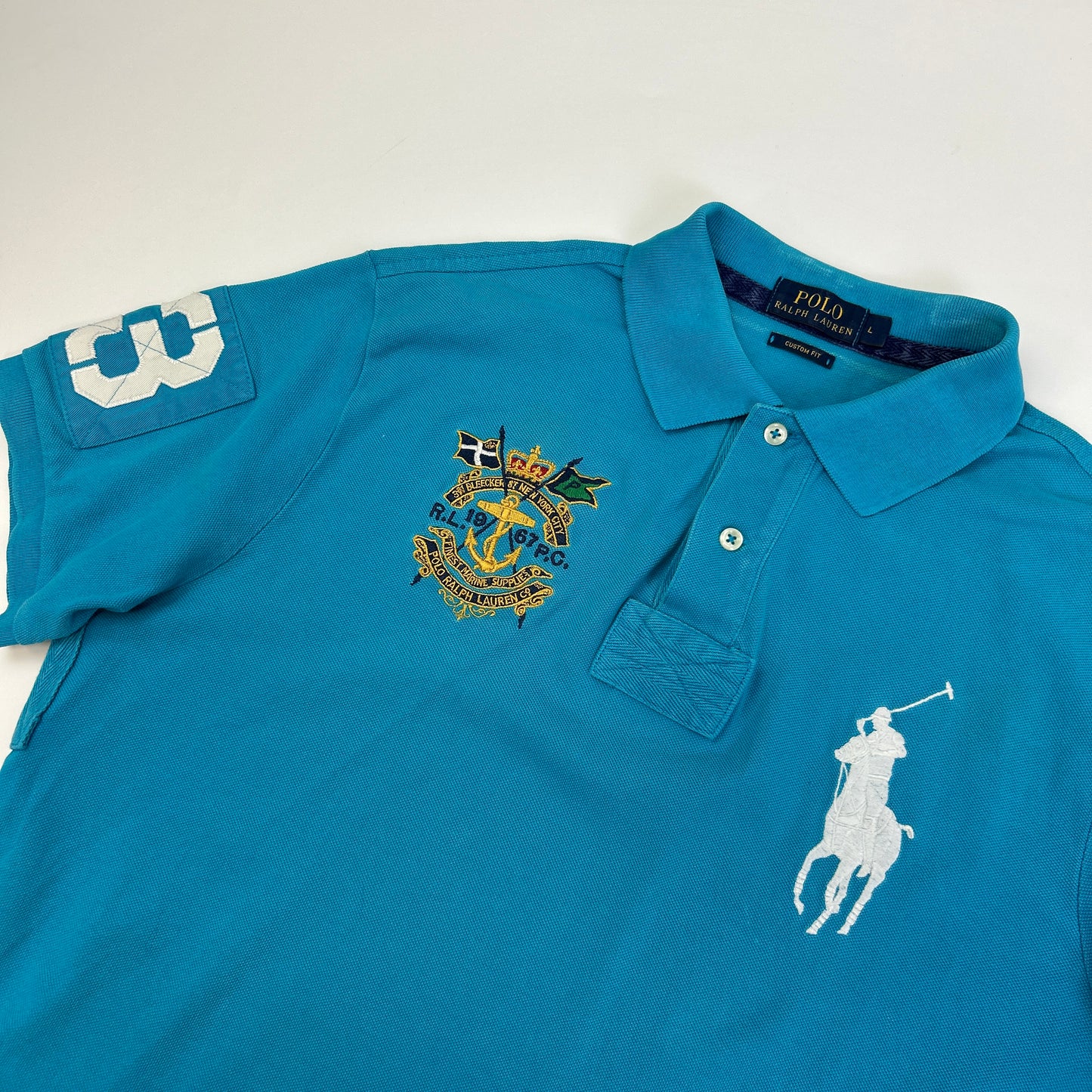 Ralph Lauren Polo (L)