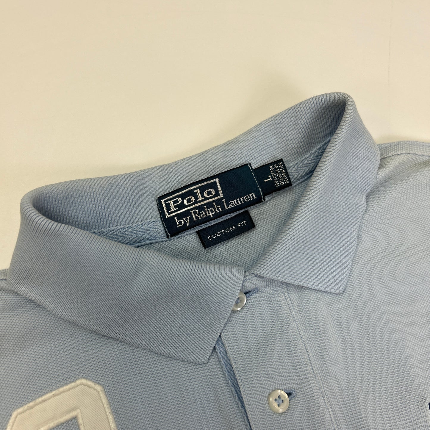 Ralph Lauren Polo (L)
